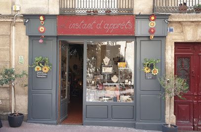 L'Instant d'Apprêts — Écusson