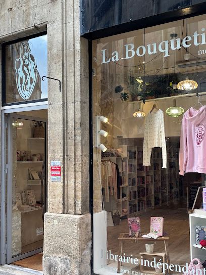 La Bouquetière — Écusson