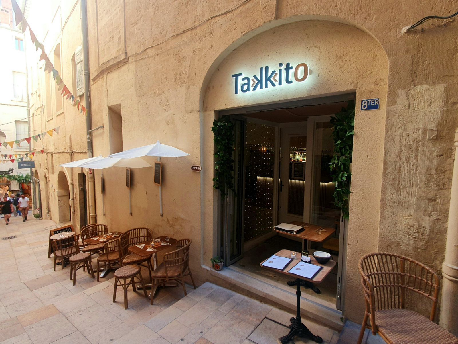 Takkito — Écusson